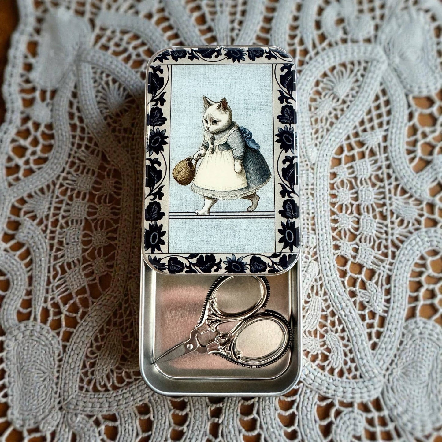 Kitty notions tin