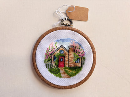 Cross Stitch framed in Hoop Art