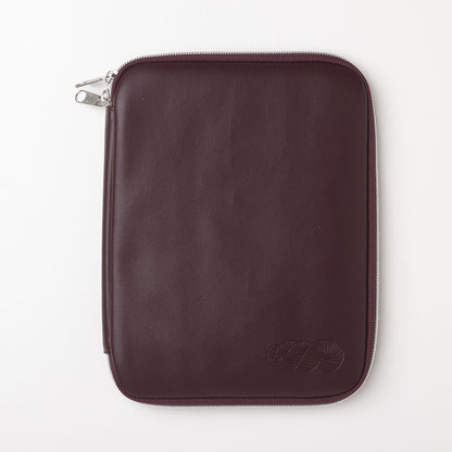 Brown leather zippered tablet or e-reader sleeve with embossed logo on white background