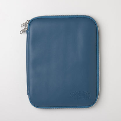 Blue zippered leather tablet or laptop sleeve with embossed logo on white background